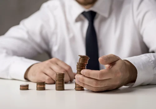 front-view-businessman-with-coins